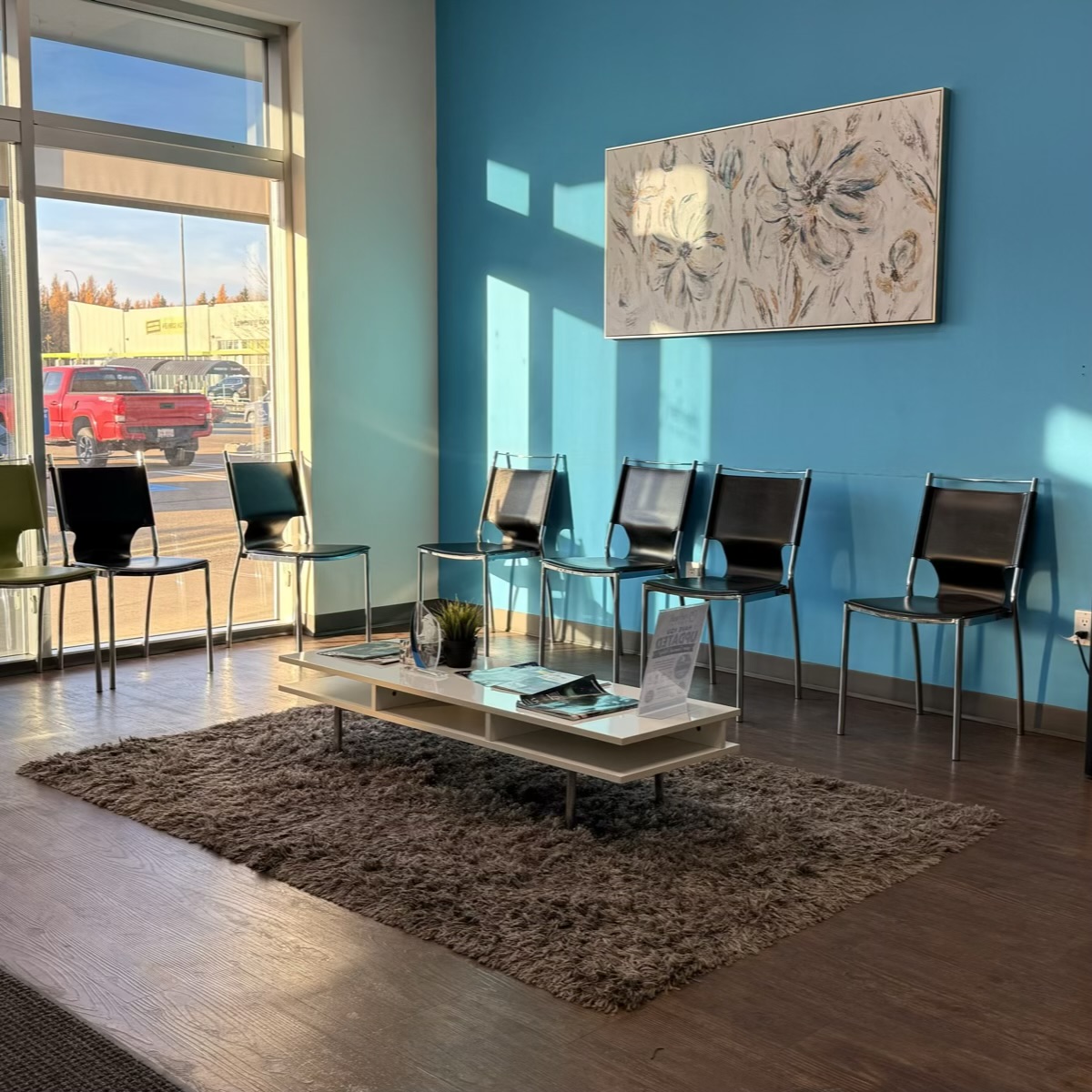 The bright waiting area with natural light at Refresh Dental in West Edmonton